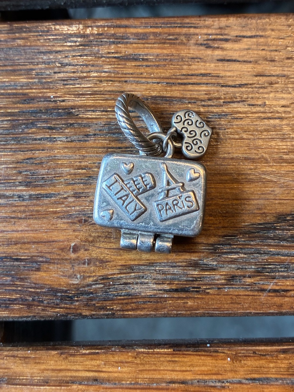 Brighton Travel Locket Charm with Italy & Paris Motifs, opens.